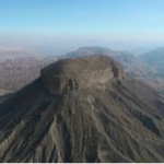 flat surface over mountain top aerial view